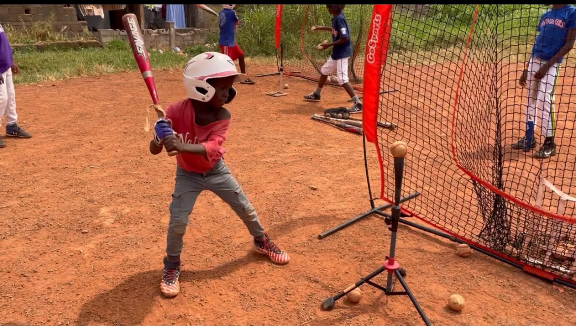 Young boy throwing Baseball